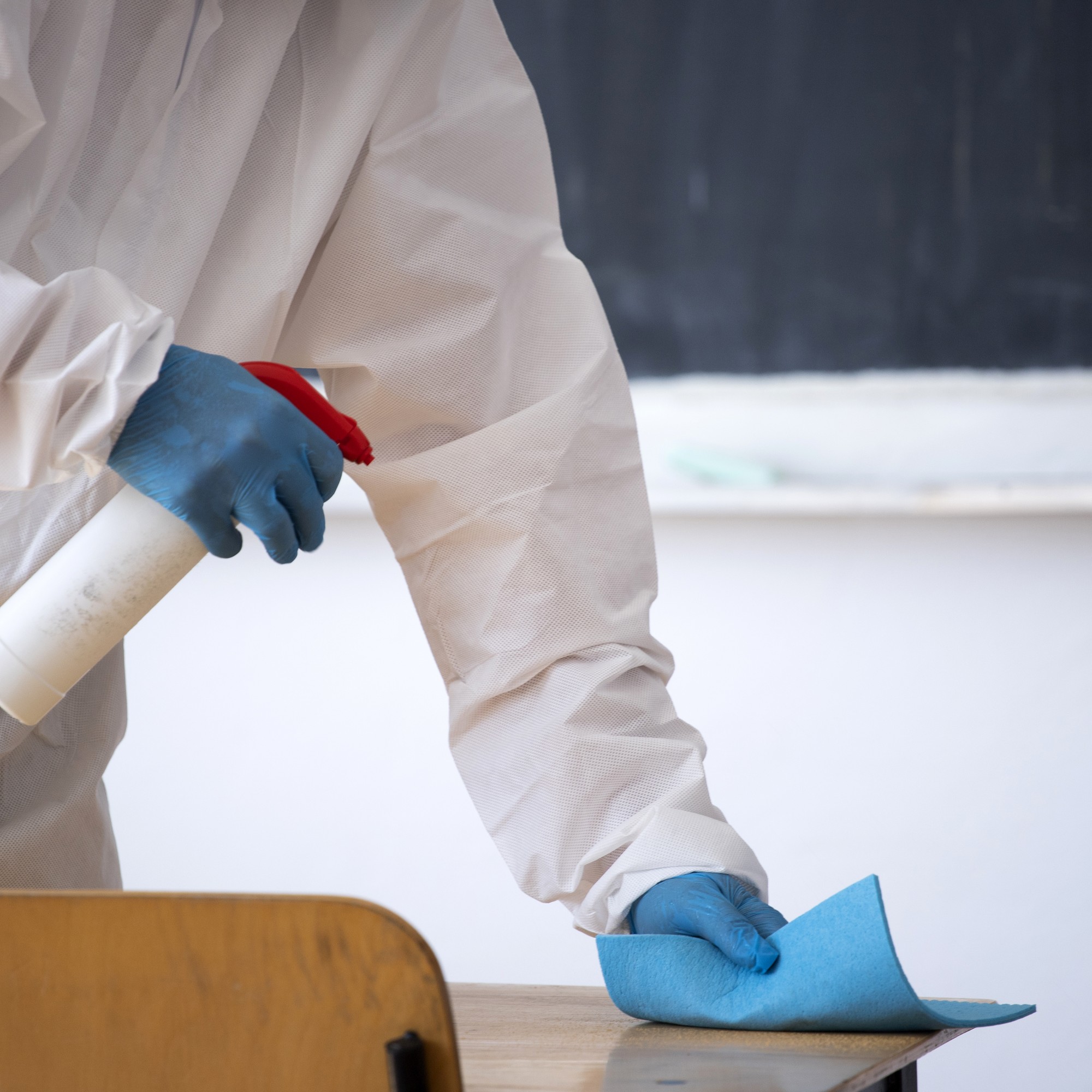 cleaning-and-disinfecting-school-desk-with-gloves-2026-03-24-22-45-19-utc-2000x2000 cleaning-and-disinfecting-school-desk-with-gloves-2026-03-24-22-45-19-utc-2000x2000