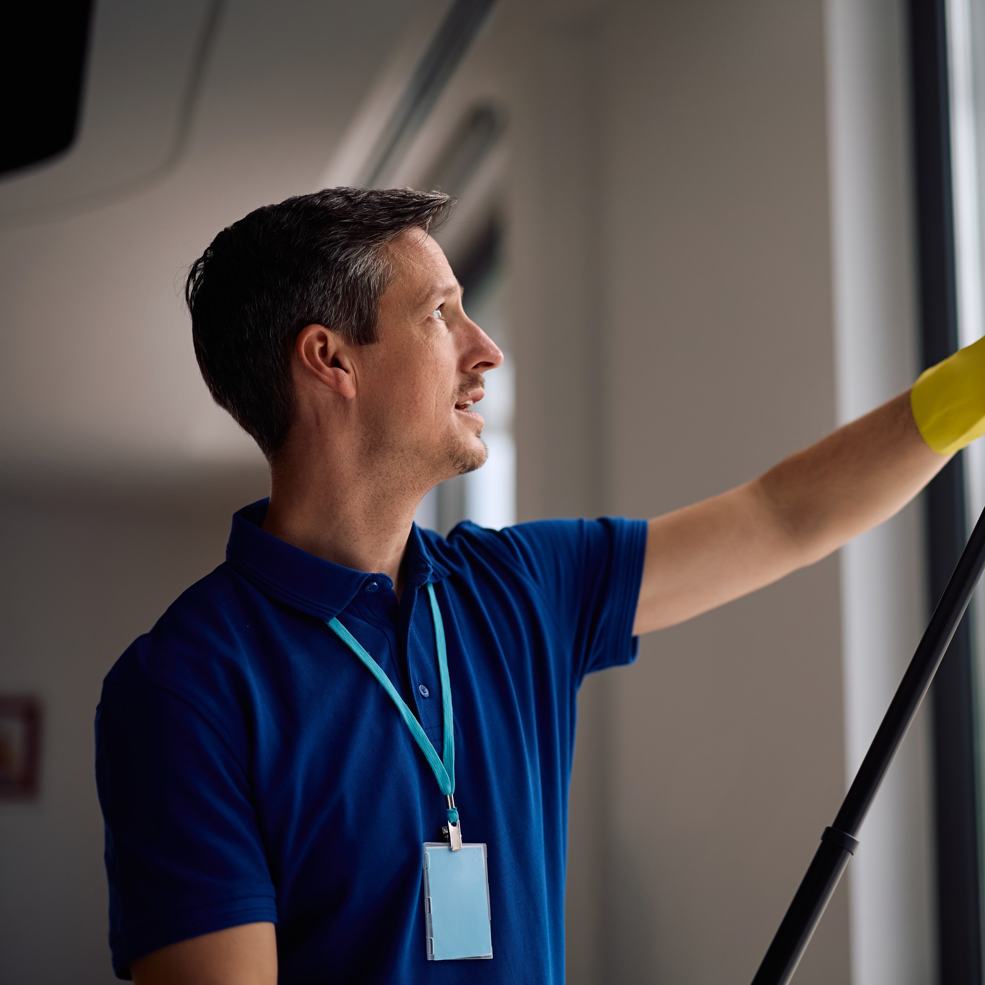 professional-male-janitor-cleaning-large-glass-win-2026-06-15-20-18-46-utc-2000x2000 professional-male-janitor-cleaning-large-glass-win-2026-06-15-20-18-46-utc-2000x2000