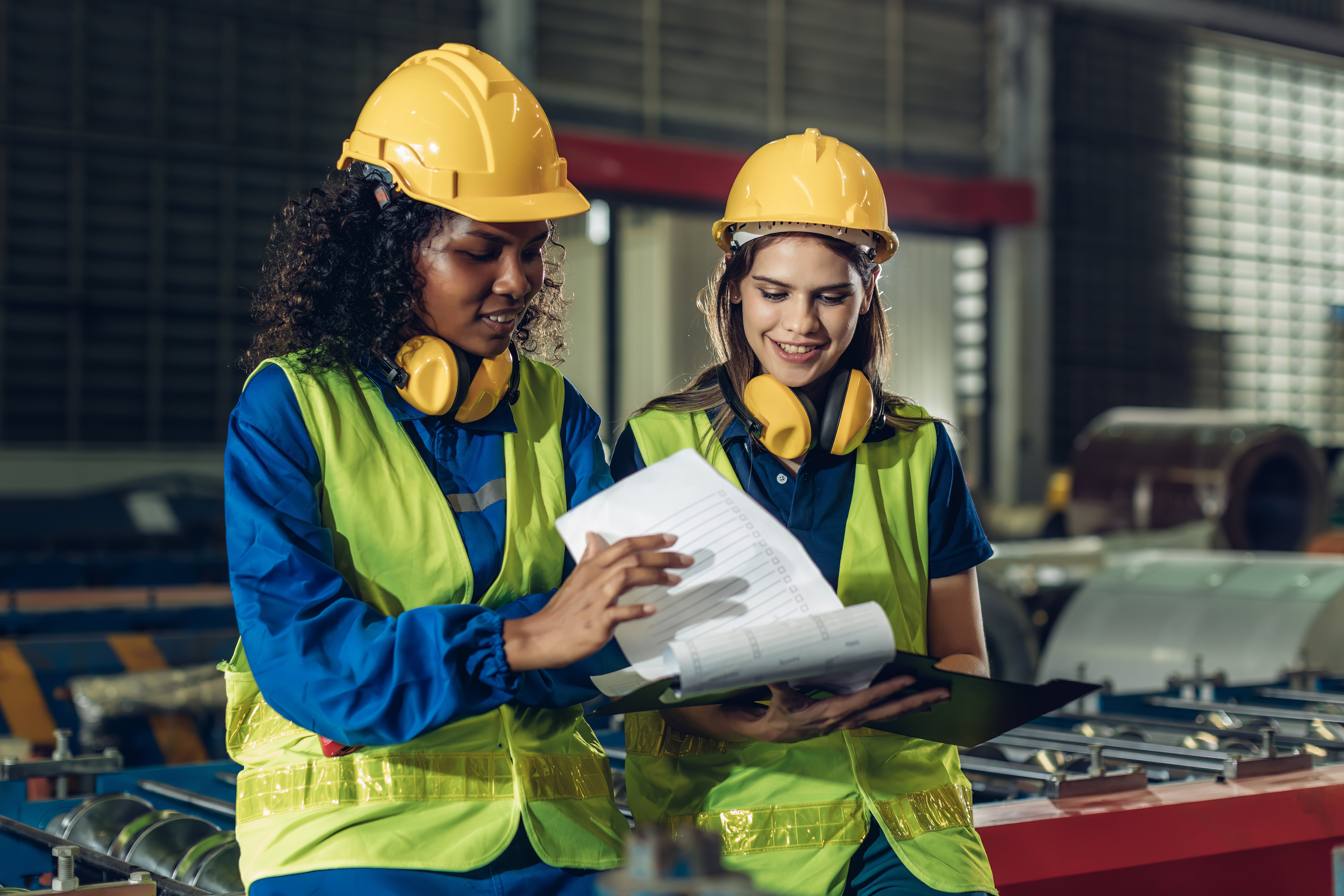 women-engineers-reviewing-plans-in-factory-setting-2026-03-24-10-13-18-utc